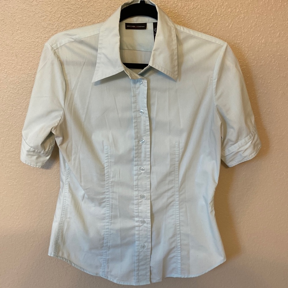 New York & Co. Woman’s blouse. Light blue. Sz M.